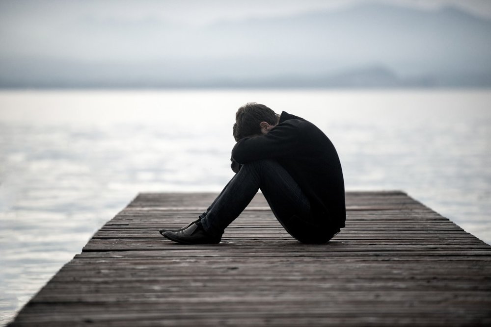 MM Blog - Grief is Stillness - Young Boy on Dock